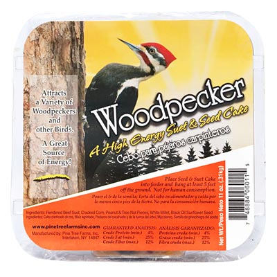 Individually wrapped suet cake labeled “Year-Round Woodpecker Delight,” packed with visible peanuts, corn, and sunflower seeds. Perfectly sized for standard suet feeders, this high-energy treat is ideal for attracting woodpeckers and other backyard birds in every season.